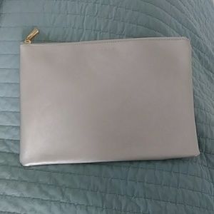 Estella Bartlett silver clutch